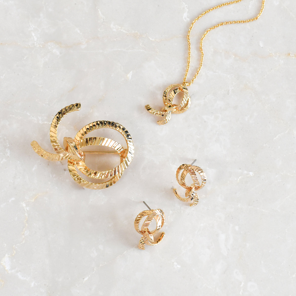 Dancing Ribbon Pierced Earrings